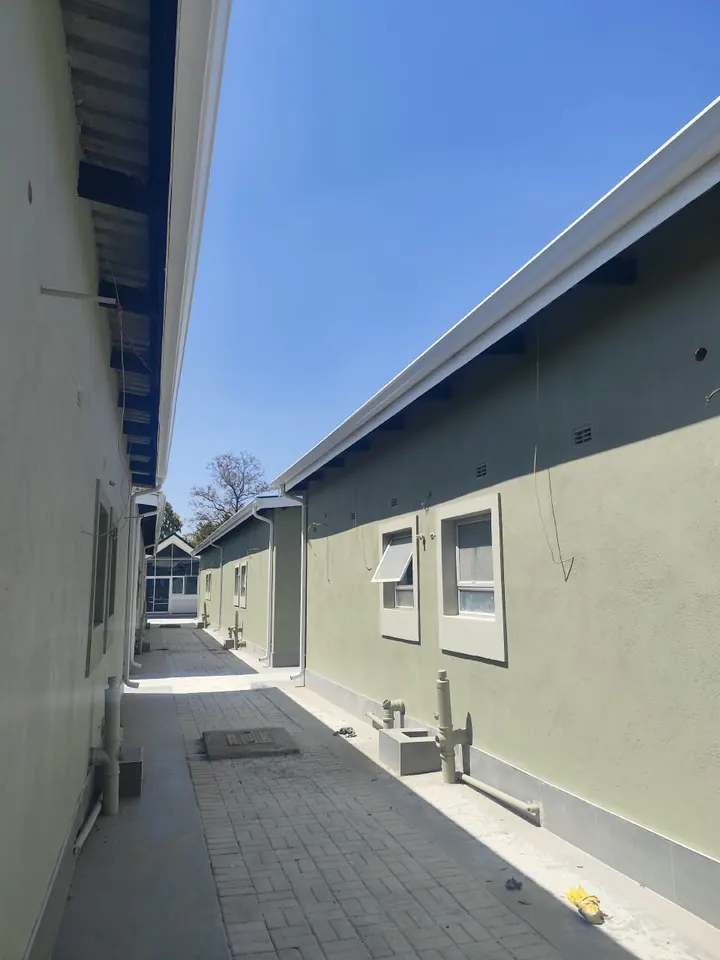 Continuous white gutters on both sides of a complex walkway