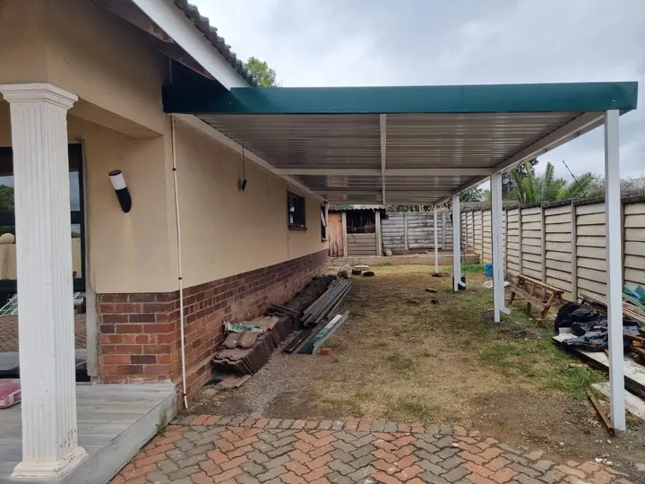Flat Chromadek roof running the length of a house